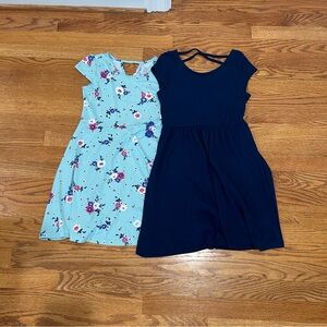 2 dresses for sale, size medium aka a 7/8 for both dresses.